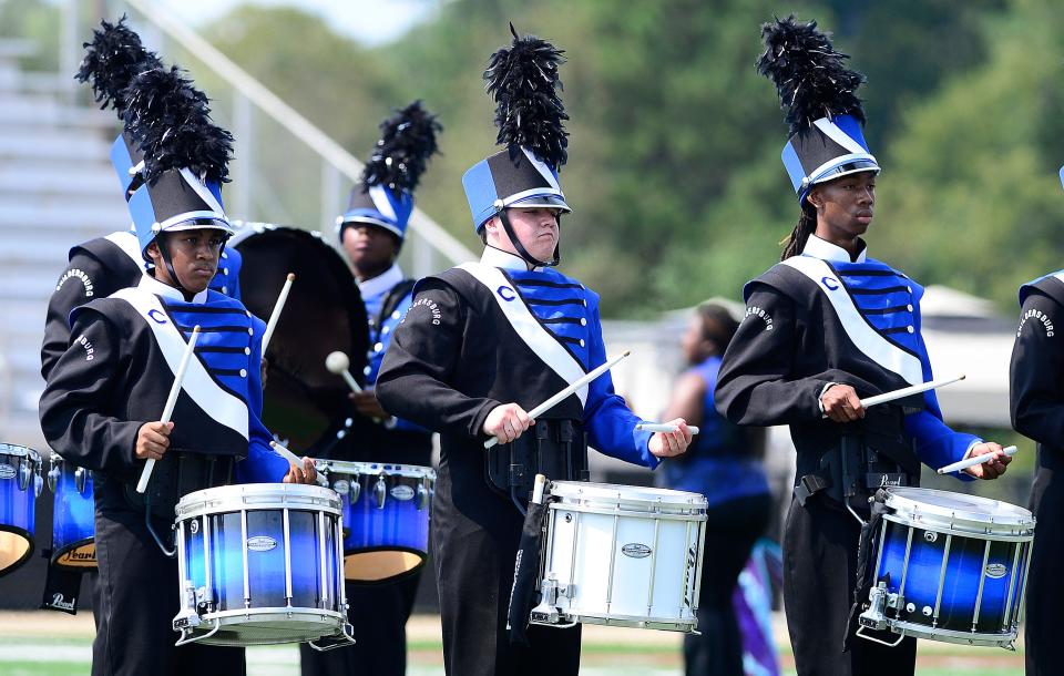 Childersburg band members perform during their set at the 2019 Mid-South Marching Band Festival at Titan Stadium in Gadsden. This year's event is Saturday.