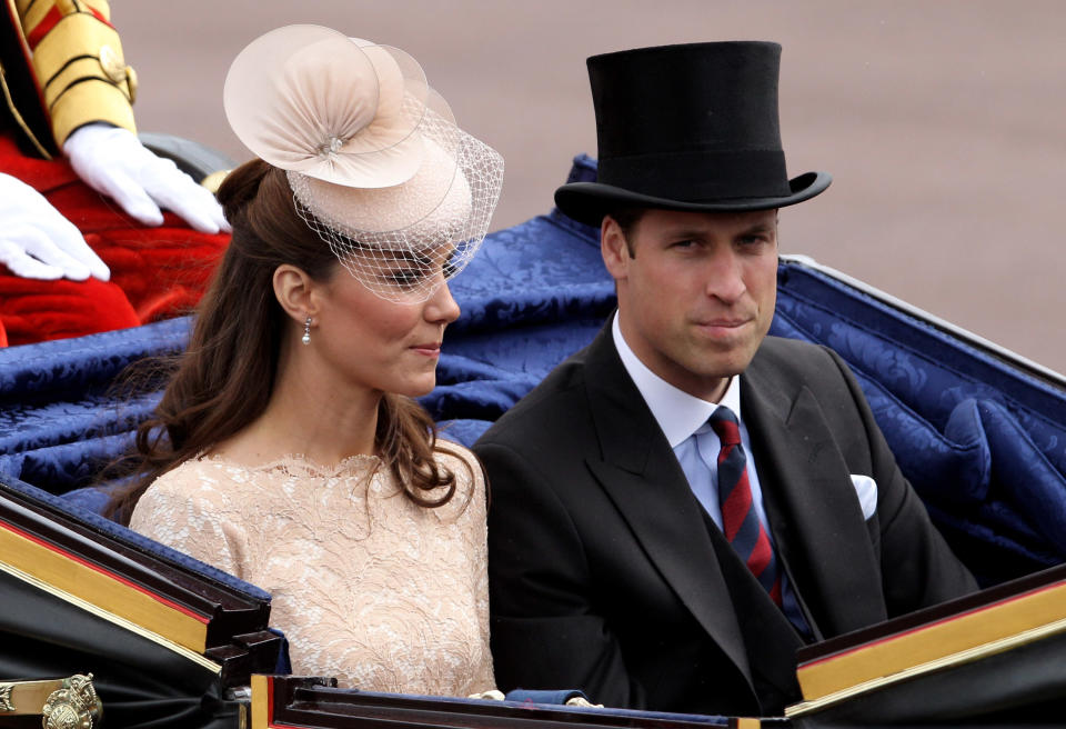 Prince William and Catherine, the Duchess of Cambridge, look on during the Diamond Jubilee carriage procession after the service of thanksgiving at St Paul's Cathedral.