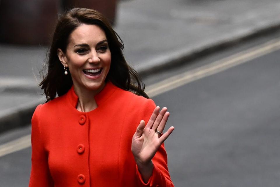 britains catherine, princess of wales waves to members of the public as she arrives to visit the dog duck pub in soho, central london, on may 4, 2023 to hear about their preparation for the coronation weekend and meet members of staff and representatives from other hospitality and recreation businesses of the area photo by ben stansall afp photo by ben stansallafp via getty images