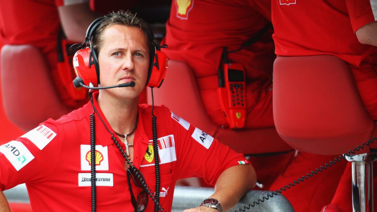 Former Ferrari Formula One World Champion Michael Schumacher of Germany is seen on the Ferrari pitwall before qualifying for the Malaysian Formula One Grand Prix at the Sepang Circuit on April 4, 2009 in Kuala Lumpur, Malaysia