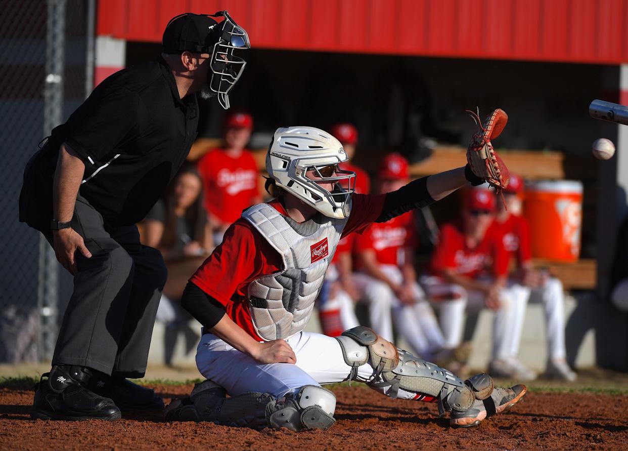 Caney Valley High School's Cooper Brim prepares to catch a pitch during baseball action earlier in the season.