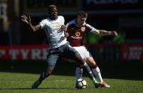 Britain Football Soccer - Burnley v Manchester United - Premier League - Turf Moor - 23/4/17 Manchester United's Paul Pogba in action with Burnley's Johann Berg Gudmundsson Reuters / Andrew Yates Livepic