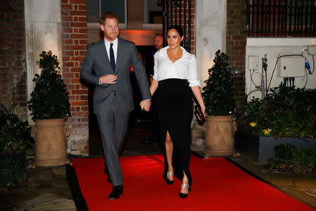 Britain's Prince Harry and Meghan, Duchess of Sussex, arrive to attend the Endeavour Fund Awards in the Drapers' Hall in London, Britain February 7, 2019. Tolga Akmen/Pool via REUTERS