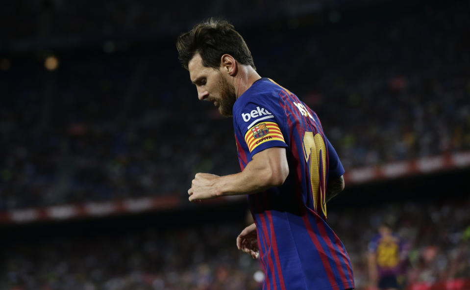 FC Barcelona's Lionel Messi looks down during the Spanish La Liga soccer match between FC Barcelona and Alaves at the Camp Nou stadium in Barcelona, Spain, Saturday, Aug. 18, 2018. (AP Photo/Manu Fernandez)