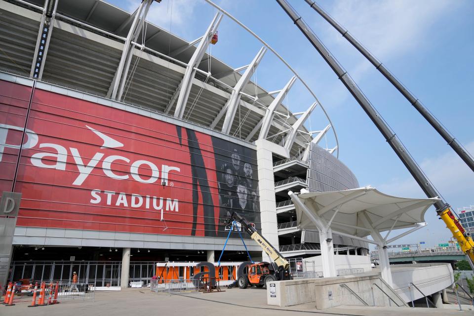 New signage is installed at Paycor Stadium Tuesday