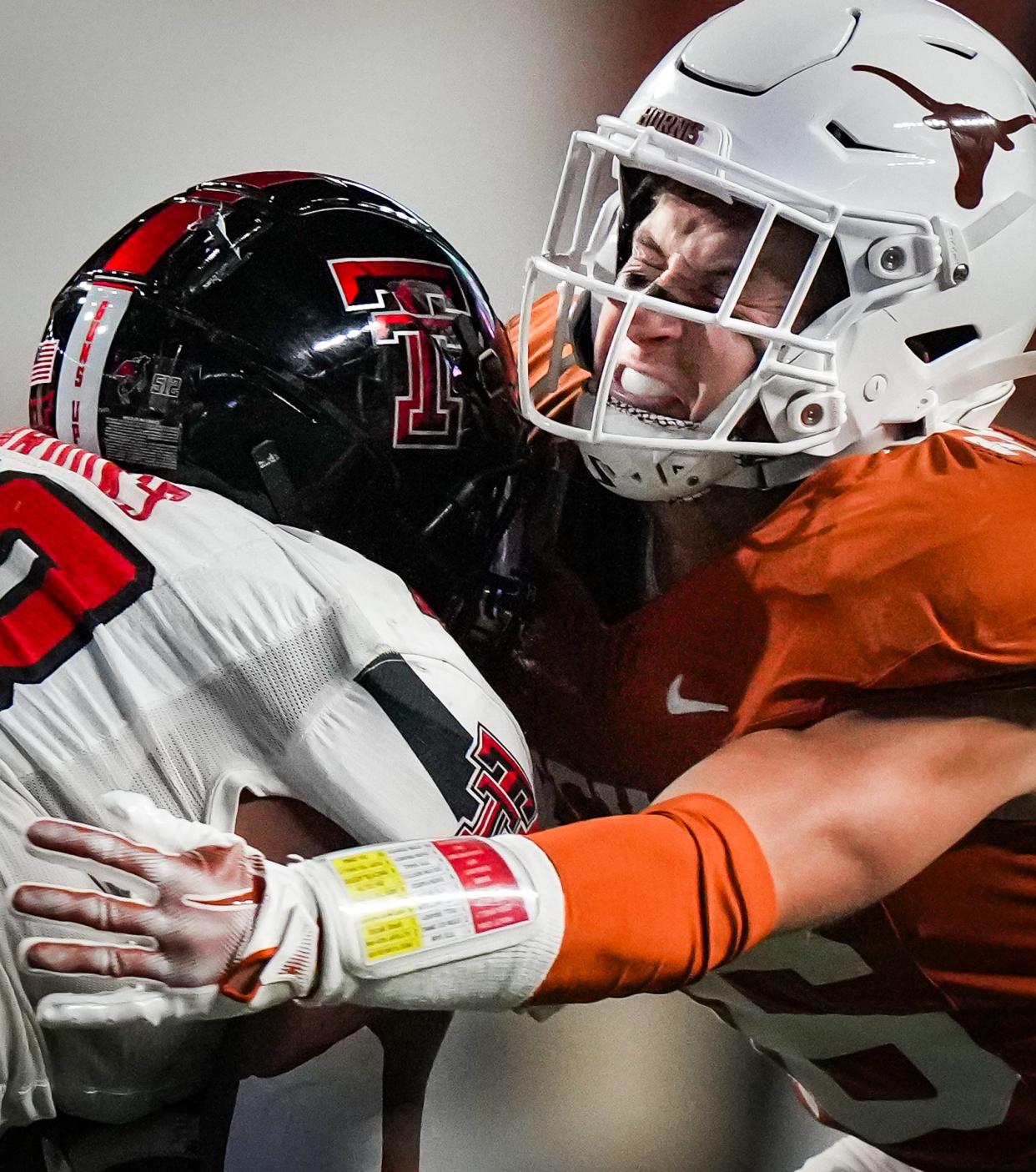 Two former Central Texas high school stars collide during the Texas-Texas Tech football game last month at Royal-Memorial Stadium. Tahj Brooks of Texas Tech is the leading rusher for the Red Raiders. Michael Taaffe has 45 tackles and three interceptions for the Longhorns.