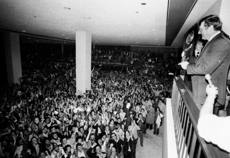 Coach Joe B. Hall looked out over the mob of 7,000 that greeted the returning Wildcats at Blue Grass Field after their NCAA championship win in St. Louis on March 28, 1978.