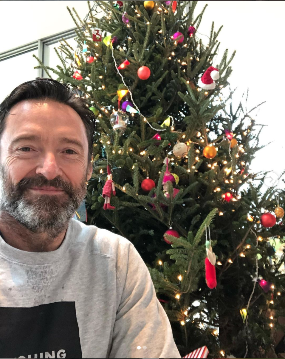 Hugh Jackman in front of his very colourful Christmas tree last year. Photo: Instagram/@thehughjackman