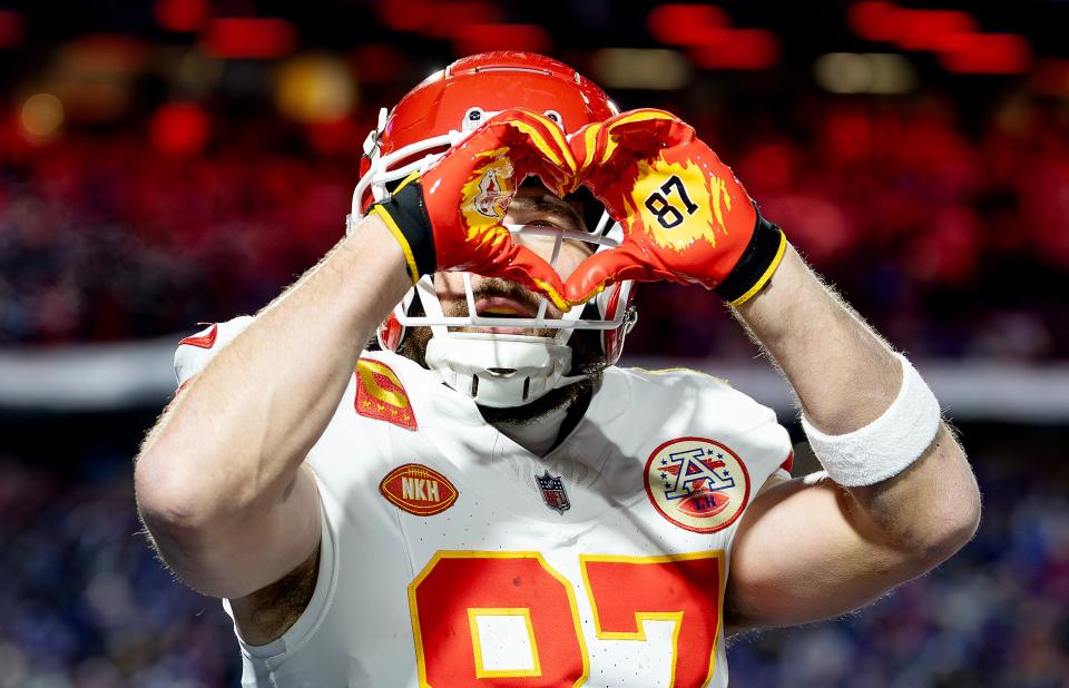 Travis Kelce celebrates after scoring a touchdown against the Buffalo Bills.