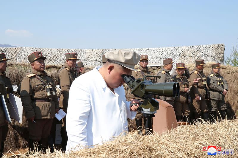 North Korean leader Kim Jong Un guides a drill of mortar sub-units of North Korean Army