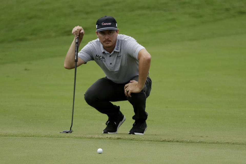 Joel Dahmen lines up a putt on the 18th hole during the third round of the World Golf Championship-FedEx St. Jude Invitational Saturday, Aug. 1, 2020, in Memphis, Tenn. (AP Photo/Mark Humphrey)