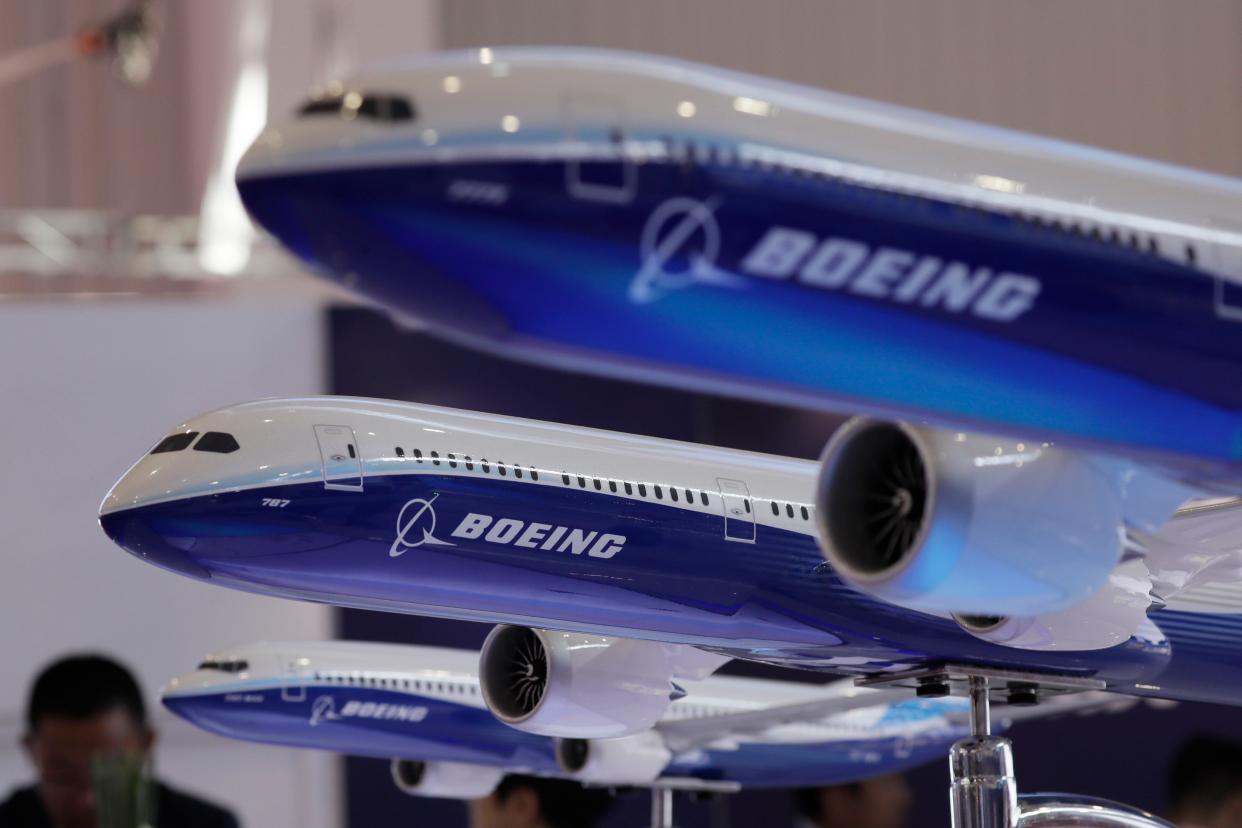 FILE- In this Nov. 6, 2018, file photo, models of Boeing passenger airliners are displayed during the Airshow China in Zhuhai city, south China's Guangdong province.