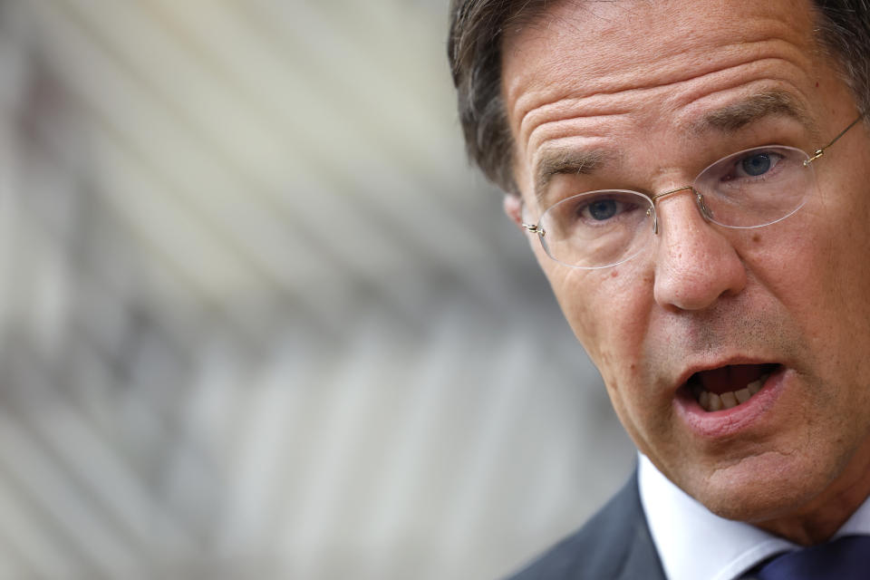 Netherland's Prime Minister Mark Rutte speaks with the media as he arrives for an EU summit in Brussels, Thursday, June 27, 2024. European Union leaders are expected on Thursday to discuss the next EU top jobs, as well as the situation in the Middle East and Ukraine, security and defence and EU competitiveness. (AP Photo/Geert Vanden Wijngaert)