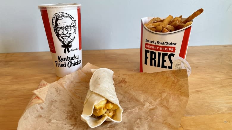 Mac and cheese wrap with fries and a drink