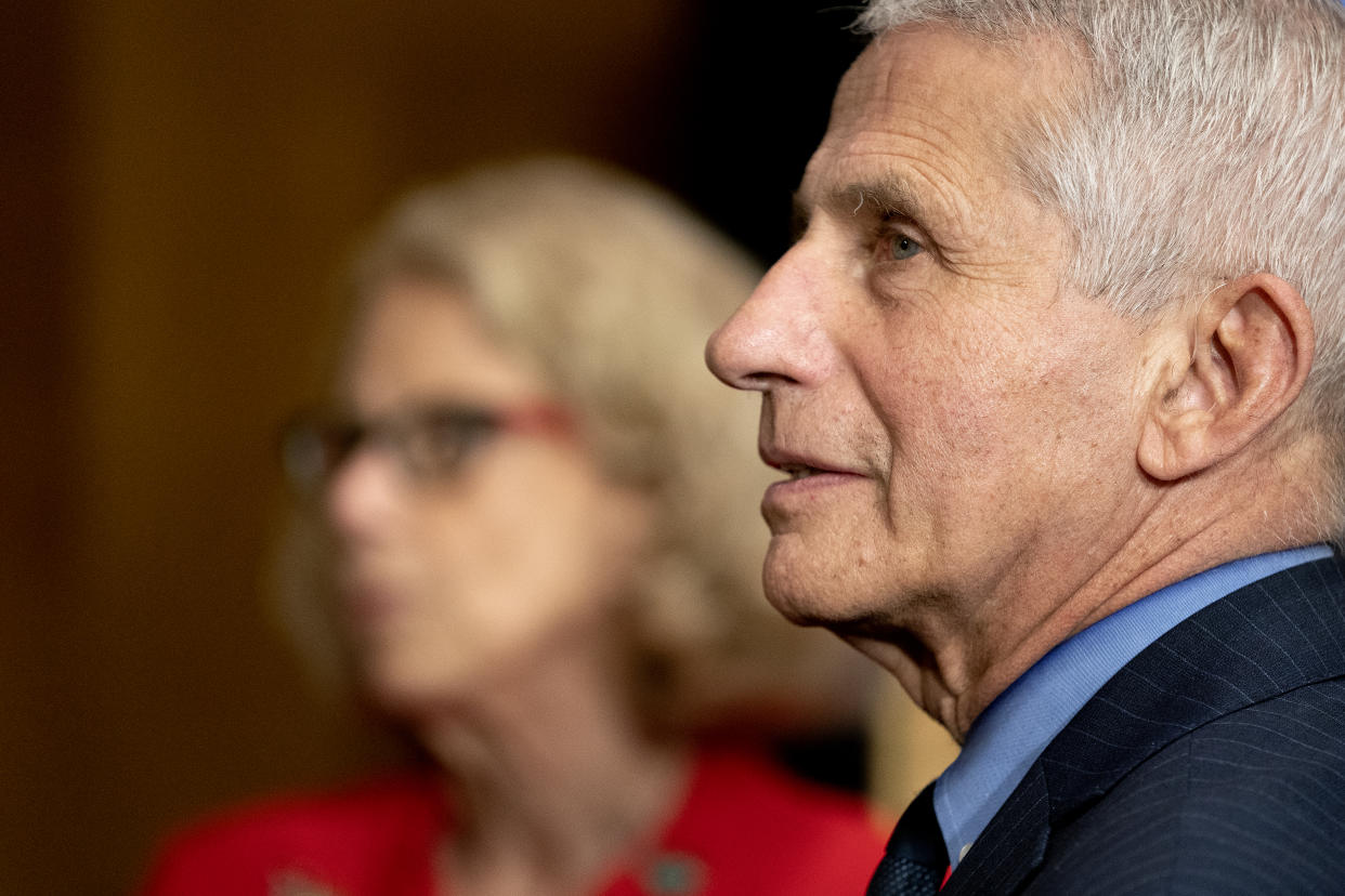 Anthony Fauci, director of the National Institute of Allergy and Infectious Diseases, right, and Diana Bianchi, director of the Eunice Kennedy Shriver National Institute of Child Health and Human Development, speak following a Senate Appropriations Subcommittee hearing in Washington, D.C., U.S., on Wednesday, May 26, 2021. (Stefani Reynolds/Bloomberg via Getty Images)