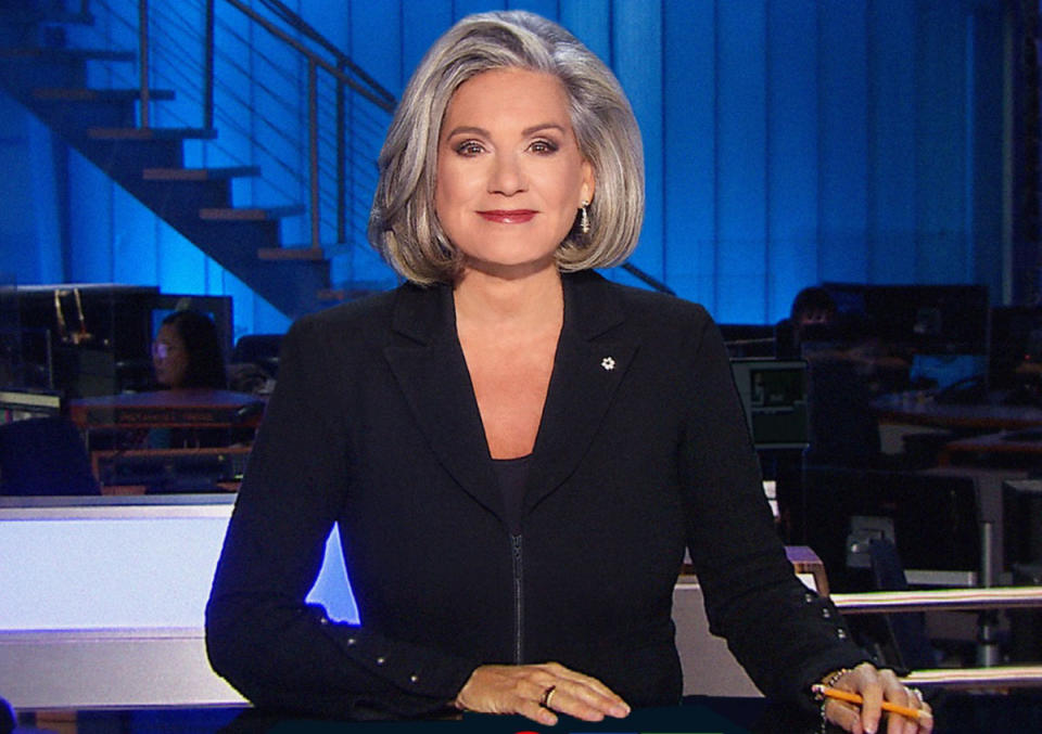 Lisa LaFlamme sits at the CTV news desk with grey hair