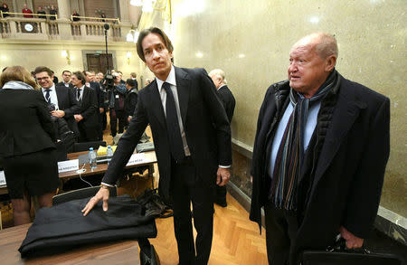 Former Austrian Finance Minister Karl-Heinz Grasser and Ernst Karl Plech arrive in the courtroom on the first day of his trial for embezzlement in Vienna, Austria, December 12, 2017. REUTERS/Helmut Fohringer/Pool