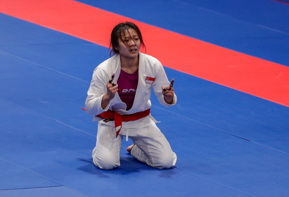 Singapore jiu-jitsu world champion Constance Lien celebrates winning her women's U-62kg final at the SEA Games. (PHOTO: Sport Singapore)