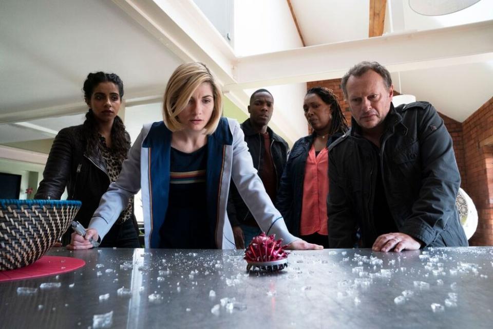 Mandip Gill as Yaz, Jodie Whittaker as The Doctor, Tosin Cole as Ryan, Jo Martin as Ruth Clayton, Neil Stuke as Lee Clayton - Doctor Who _ Season 12, Episode 5 - Photo Credit: Ben Blackall/BBC Studios/BBC America | Ben Blackall/BBC Studios/BBC America