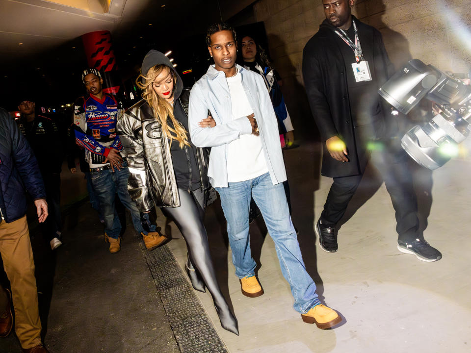 Rihanna and Travis Scott leave the Ferrari garage after  the Formula 1 Grand Prix on November 18, 2023 in Las Vegas, Nevada.