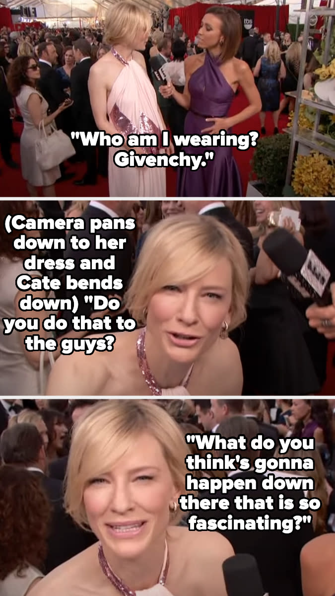 Cate Blanchett on the red carpet discusses her dress with a reporter; she bends down to mock the camera focusing on her outfit's lower part