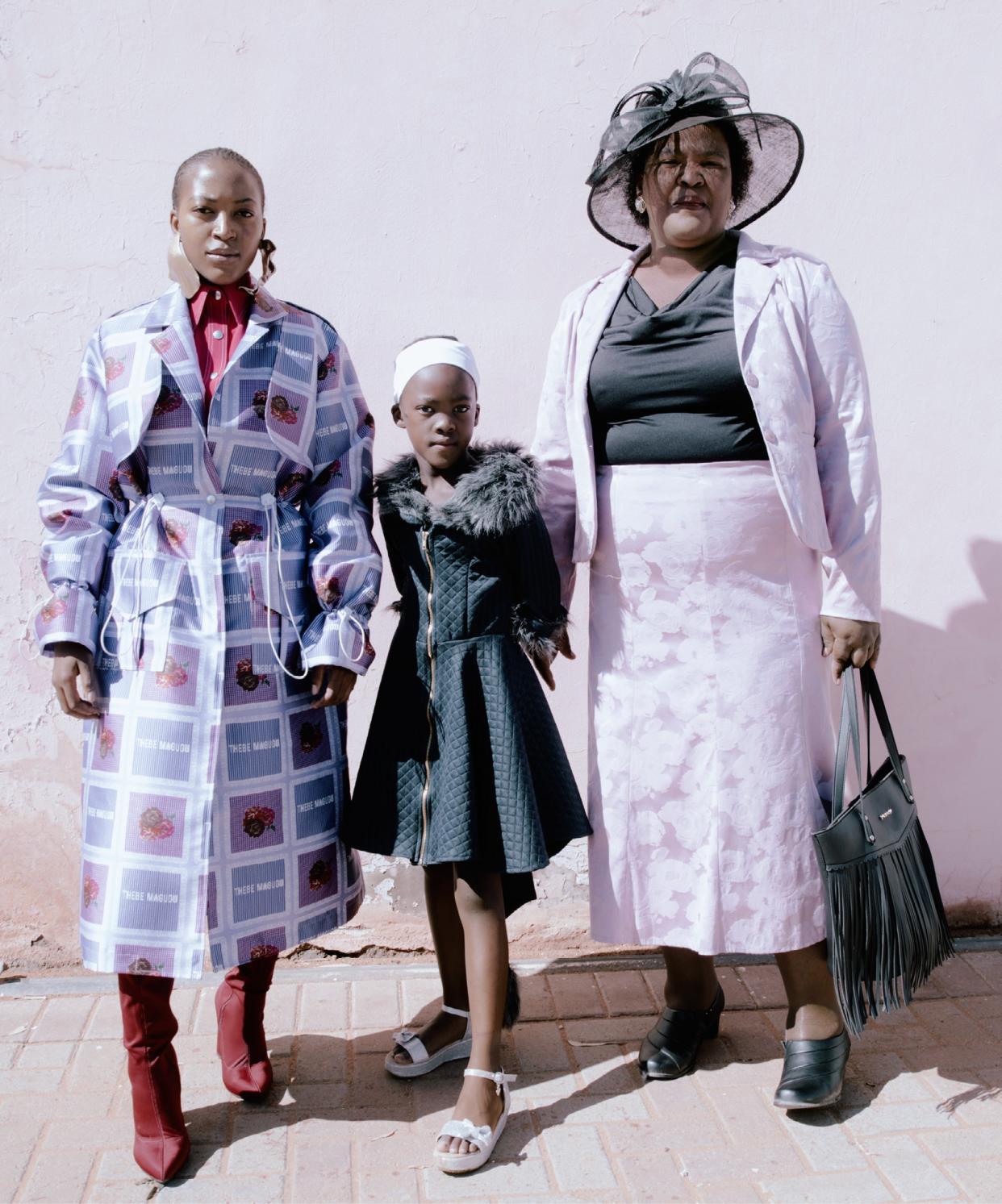 FROM FAR LEFT: Bernelee Ndubula (in Thebe Magugu), Khanyisile Solani, and Susan Solani, fellow residents of Kimberley, in February.