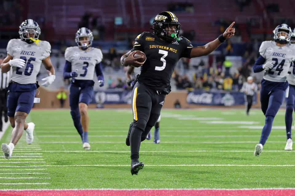 MOBILE, ALABAMA - DECEMBER 17: Frank Gore Jr. #3 of the Southern Miss Golden Eagles rushes for a touchdown during the first half against the Rice Owls of the LendingTree Bowl at Hancock Whitney Stadium on December 17, 2022 in Mobile, Alabama. (Photo by Jonathan Bachman/Getty Images)
