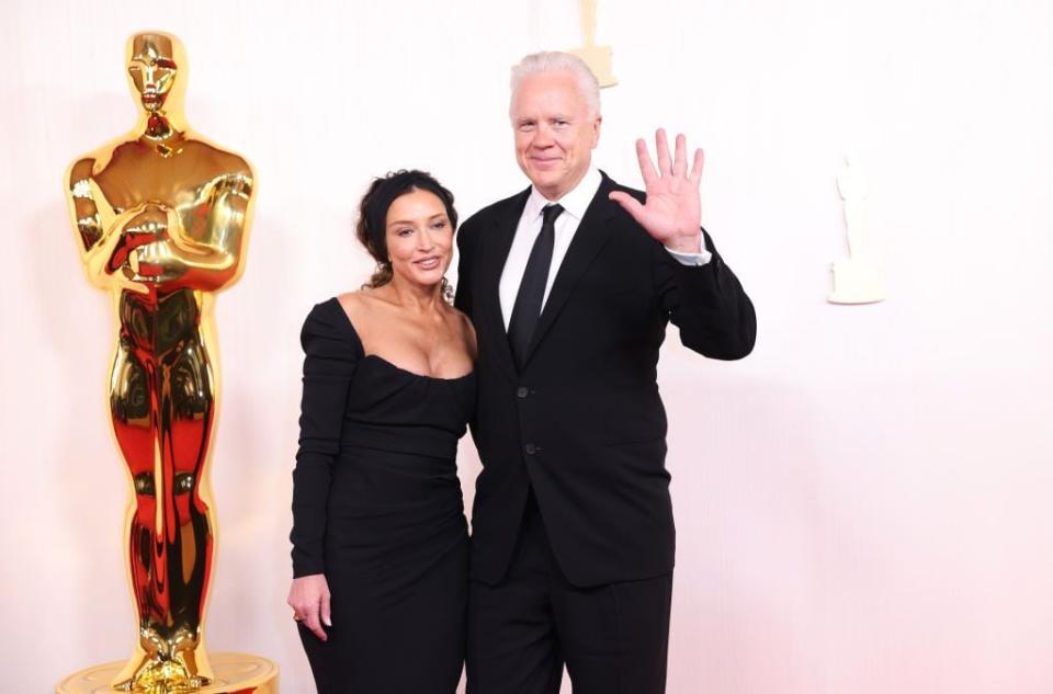 Tim Robbins and Reed Morano arrive at the 96th Academy Awards.