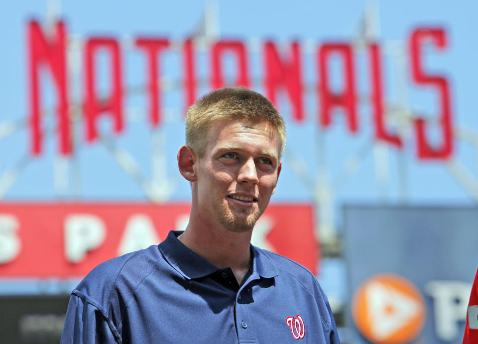 FILE - Pitcher Stephen Strasburg, the No. 1 overall draft pick, appears during a news conference with the Washington Nationals baseball team at Nationals Park in Washington, Aug. 21, 2009. Nationals pitcher Stephen Strasburg has decided to announce his retirement, ending a career that began as a No. 1 draft pick, included 2019 World Series MVP honors and was derailed by injuries, according to a person with knowledge of the situation. The person spoke to The Associated Press on condition of anonymity Thursday, Aug. 24, 2023, because Strasburg has not spoken publicly about his plans.(AP Photo/Charles Dharapak, File)