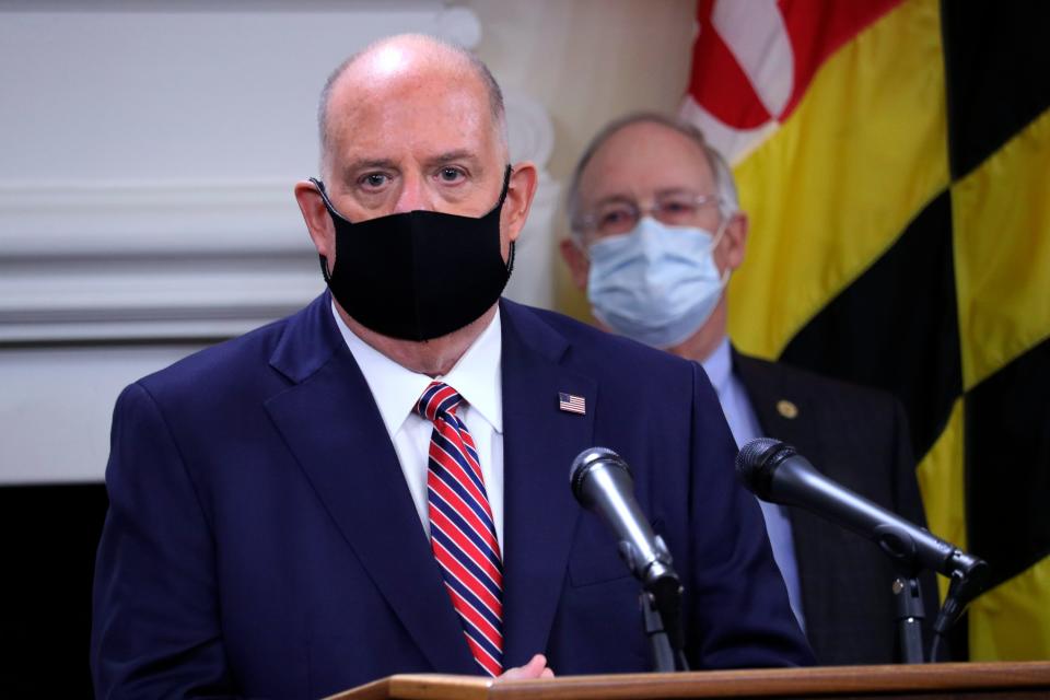 Maryland Gov. Larry Hogan urges people to wear masks to prevent the spread of the coronavirus while speaking at a news conference Nov. 5, 2020, in Annapolis, Maryland.