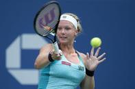 Kiki Bertens of the Netherlands hits a return to Serena Williams of the U.S. during their second round match at the U.S. Open Championships tennis tournament in New York, September 2, 2015. REUTERS/Carlo Allegri