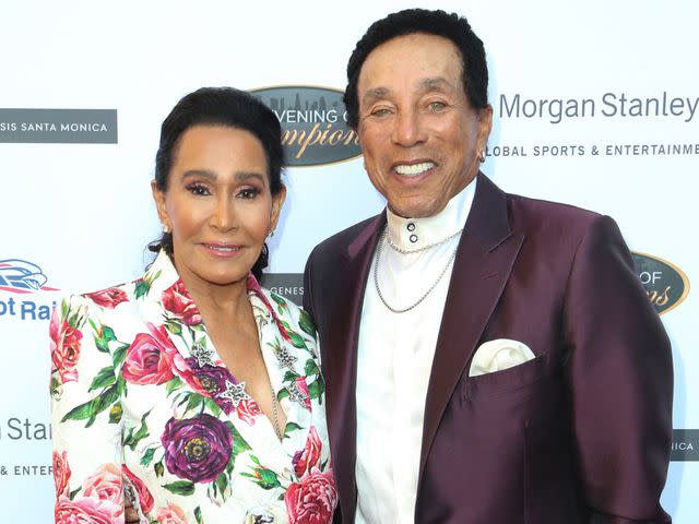 <p>Maury Phillips/Getty</p> Smokey Robinson and his wife Frances Robinson at an event to kick off MLB All-Star Weekend in July 2022.