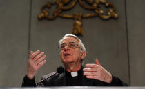 Vatican spokesman Father Federico Lombardi talks to reporters during a news conference at the Vatican February 11, 2013. Pope Benedict has no specific illness and his decision to resign was taken with no outside pressure, the Vatican spokesman said on Monday after the pontiff's shock announcement that he would step down at the end of this month. REUTERS/Alessandro Bianchi (VATICAN - Tags: RELIGION) - RTR3DMUU