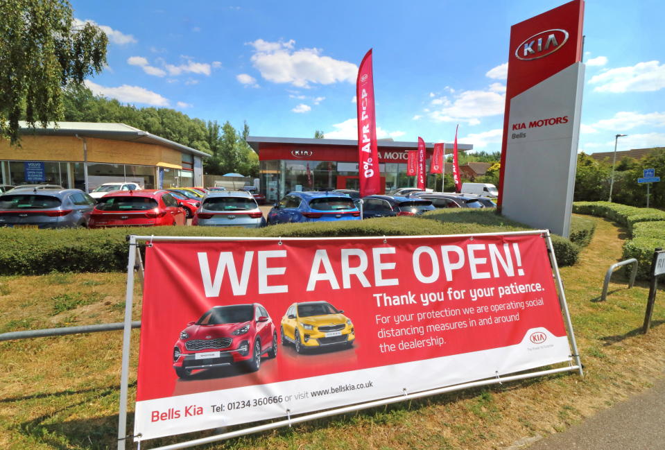 LONDON, UNITED KINGDOM - 2020/05/31: Cars are seen parked outside the forecourt of Bells as Kia Motors main dealer prepares to reopen tomorrow.
Car dealers showrooms will re-open in England tomorrow, 1st June, with strict health and safety measures following the Government's easing of restrictions to kick-start the economy. (Photo by Keith Mayhew/SOPA Images/LightRocket via Getty Images)