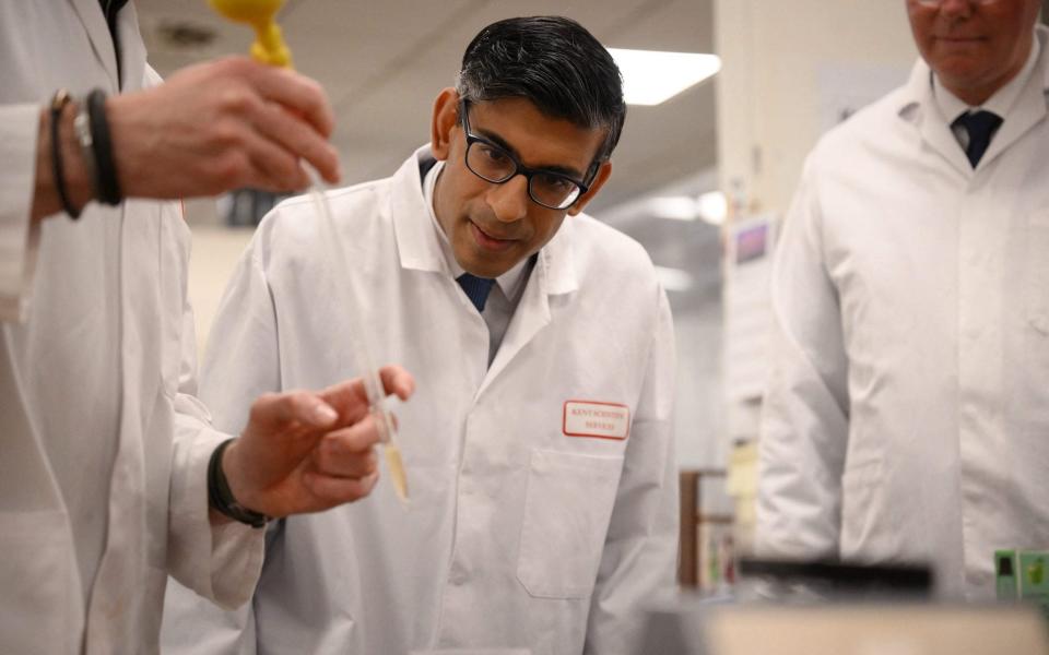 Rishi Sunak, the Prime Minister, observes as a test is made on vaping products during a visit to Kent Scientific Services in West Malling in Kent - Daniel Leal/AFP