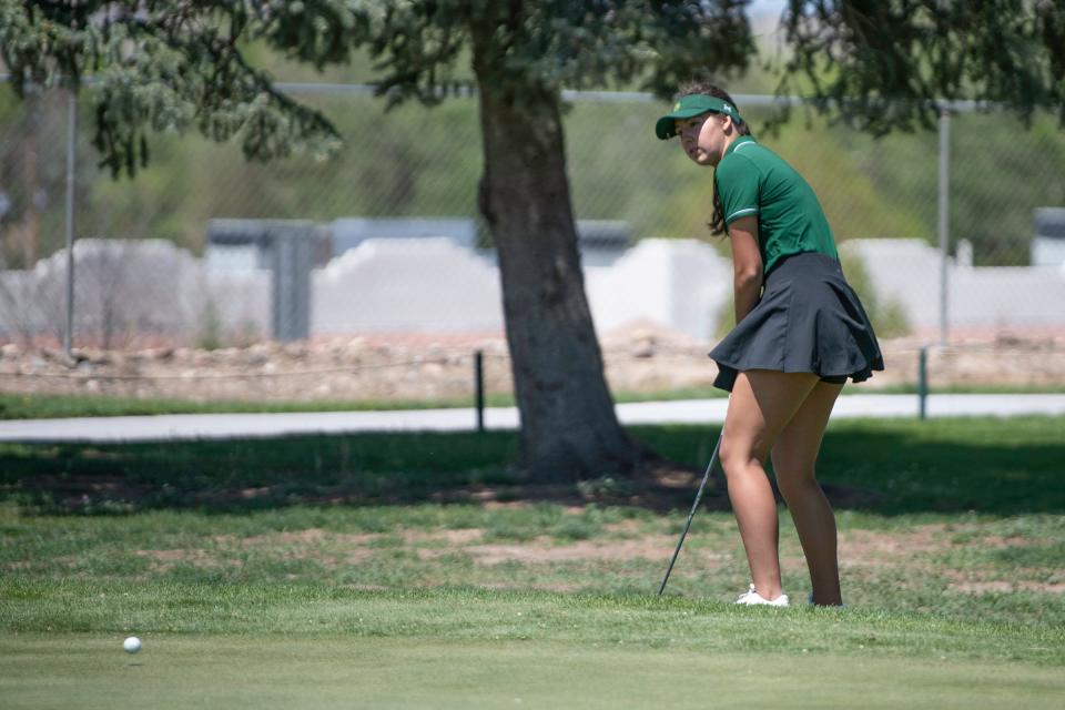 Pueblo County's Amanda Alfonso chips onto the green of the third hole during the Pueblo Girls City Championship at Elmwood Golf Course on Thursday, May 2, 2024.