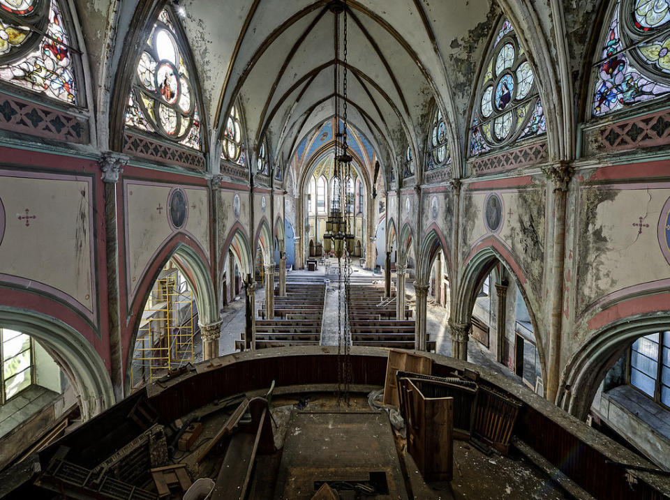 Though the stained glass still shines brightly, this Pennsylvania church is in a sad state of disrepair.  Credit: <a href="https://www.facebook.com/odinsravenphotography" target="_blank">Dan Marbaix</a>