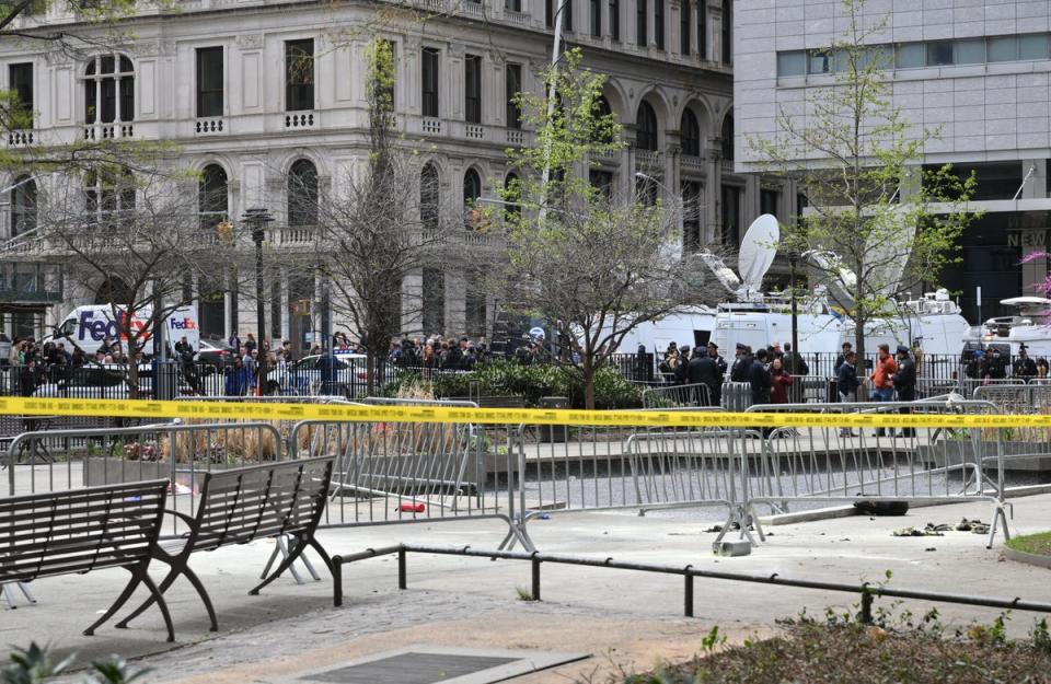 The aftermath of the area where a man self immolated (AFP via Getty Images)