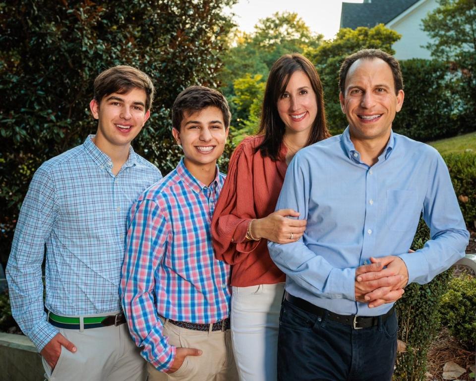 Craig Greenberg (right), who is running for Louisville mayor, is pictured (from l to r) with his sons Daniel and Benjamin and wife Rachel.