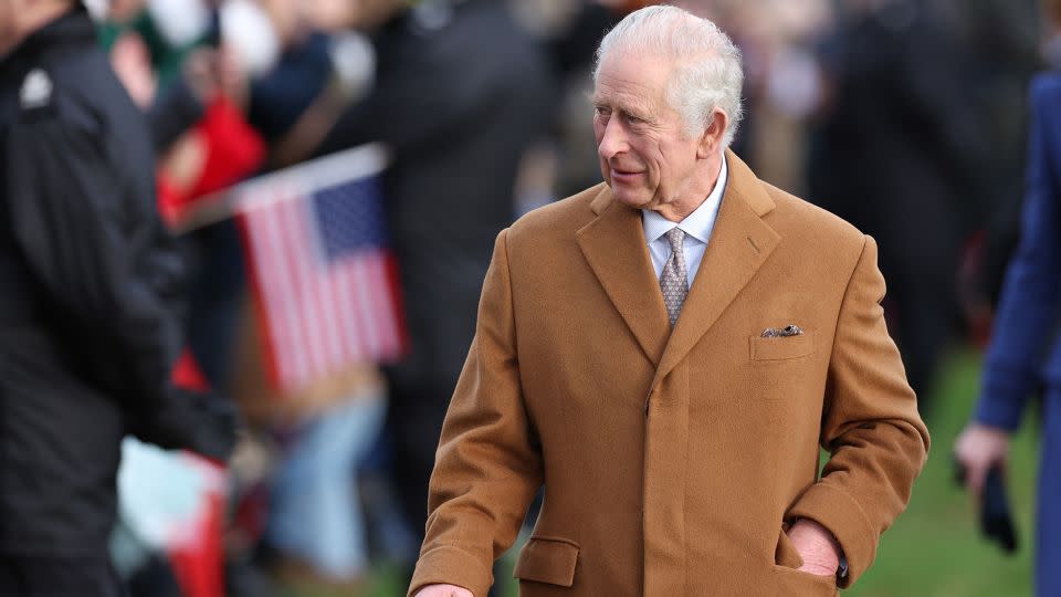 Britain's King Charles III arrives for the royal family's traditional Christmas Day service at St. Mary Magdalene Church on the Sandringham Estate in eastern England, on December 25. - Adrian Dennis/AFP/Getty Images