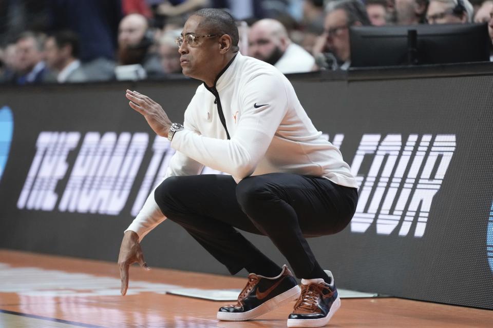 Texas interim head coach Rodney Terry watches during the first half of a second-round college basketball game in the NCAA Tournament Saturday, March 18, 2023, in Des Moines, Iowa. (AP Photo/Morry Gash)