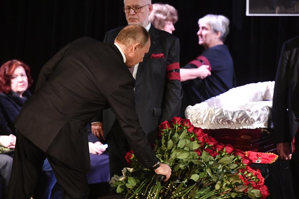 Russian President Vladimir Putin, left, pays his last respects to Lyudmila Alexeyeva, the Moscow Helsinki Group Chair and human rights activist during a farewell ceremony in Moscow, Russia, Tuesday, Dec. 11, 2018. A Russian rights official says Lyudmila Alexeyeva, who was forced into exile by Soviet authorities after founding Russia's oldest human rights organization in 1976, has died in a Moscow hospital at 91 it was reported on Saturday, Dec. 8, 2018. (Alexander Nemenov/Pool Photo via AP)