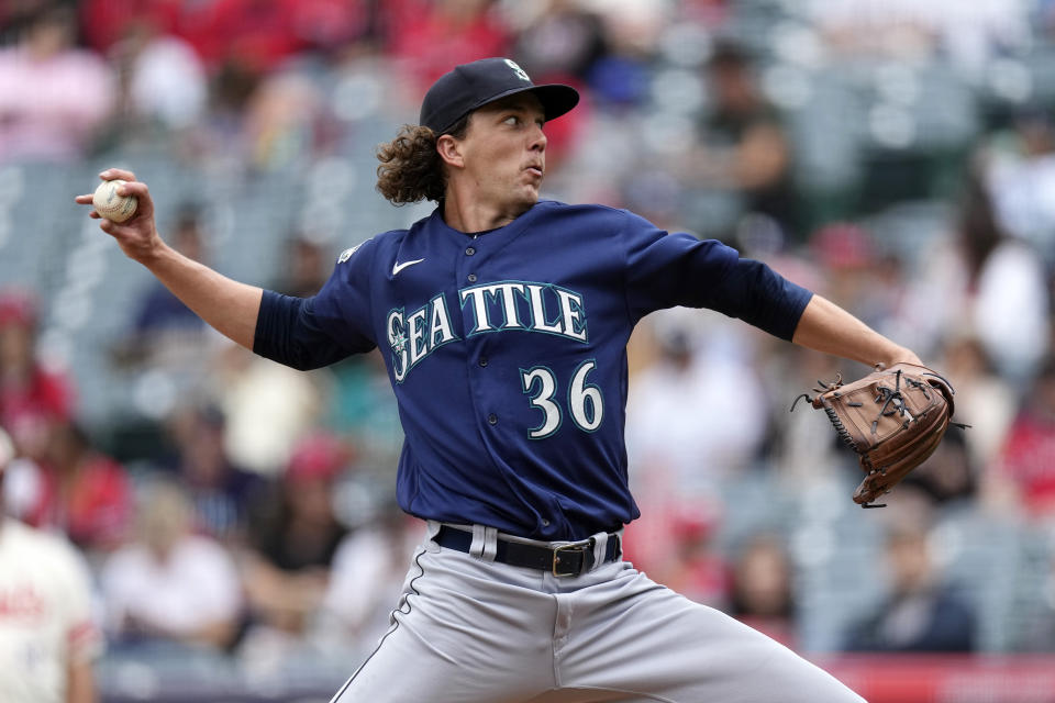 Seattle Mariners starting pitcher Logan Gilbert throws to the plate during the first inning of a baseball game against the Los Angeles Angels Sunday, June 11, 2023, in Anaheim, Calif. (AP Photo/Mark J. Terrill)