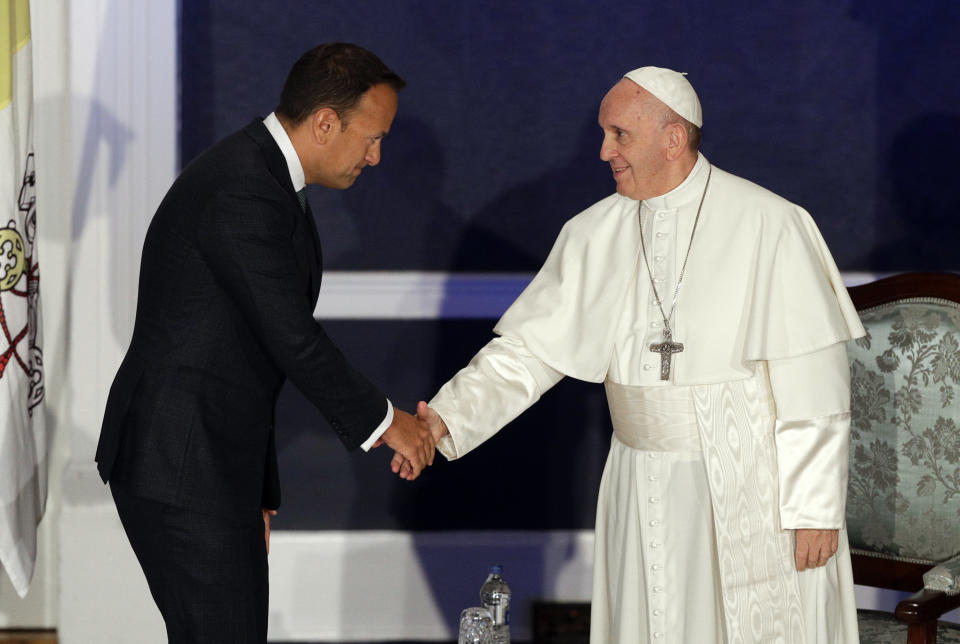 Pope Francis shakes hands with Irish Prime Minister Leo Varadkar as they meet, in Dublin, Ireland, Saturday, Aug. 25, 2018. Pope Francis is on a two-day visit to Ireland. (AP Photo/Gregorio Borgia)