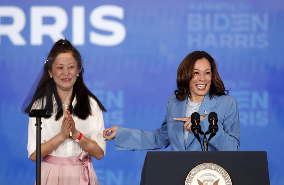 Vice President Kamala Harris, right, shares the stage with Las Vegas restaurant owner Maya Kwong at a campaign rally Tuesday, July 9, 2024, in Las Vegas. Harris announced the launch of Asian American, Native Hawaiian, and Pacific Islanders (AANHPI) for Biden-Harris, a national program to mobilize AANHPI voters. (Steve Marcus/Las Vegas Sun via AP)