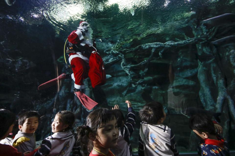 A diving Santa Claus in Seoul, South Korea