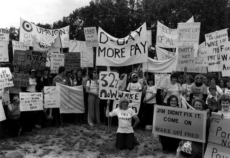 7th June 1978:  RAF wives demonstrating against low wages. Their banners read; 'D-Day More Pay', '32% Now' and 'Parity Not Charity'.  (Photo by Evening Standard/Getty Images)