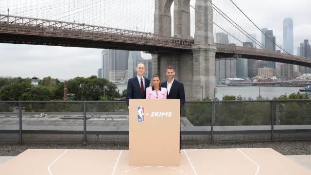 Adam Silver, Kim Kardashian and Jens Grede at an NBA x Skims podium in New York City