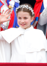 <p> Princess Charlotte wore a similar look to her mother, the Princess of Wales, at the King's Coronation in 2023. The youngster wore an ivory Alexander McQueen dress which she accessorised with a silver bullion and crystal flower crown designed by Jess Collett in collaboration with Alexander McQueen. </p>