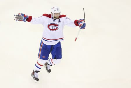 FILE PHOTO: May 25, 2014; New York, NY, USA; Montreal Canadiens defenseman Andrei Markov (79) celebrates a goal by defenseman P.K. Subban (not pictured) against the New York Rangers during the third period in game four of the Eastern Conference Final of the 2014 Stanley Cup Playoffs at Madison Square Garden. Brad Penner-USA TODAY Sports/File Photo